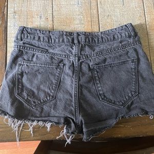 Black ripped shorts